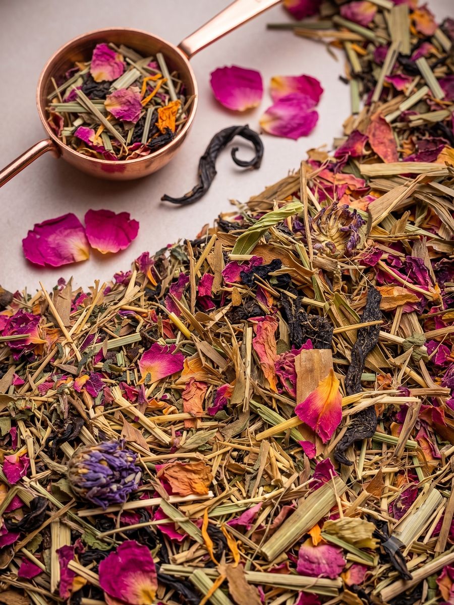 Radiant Roots Beauty Tea loose leaf blend with rose petals and botanicals